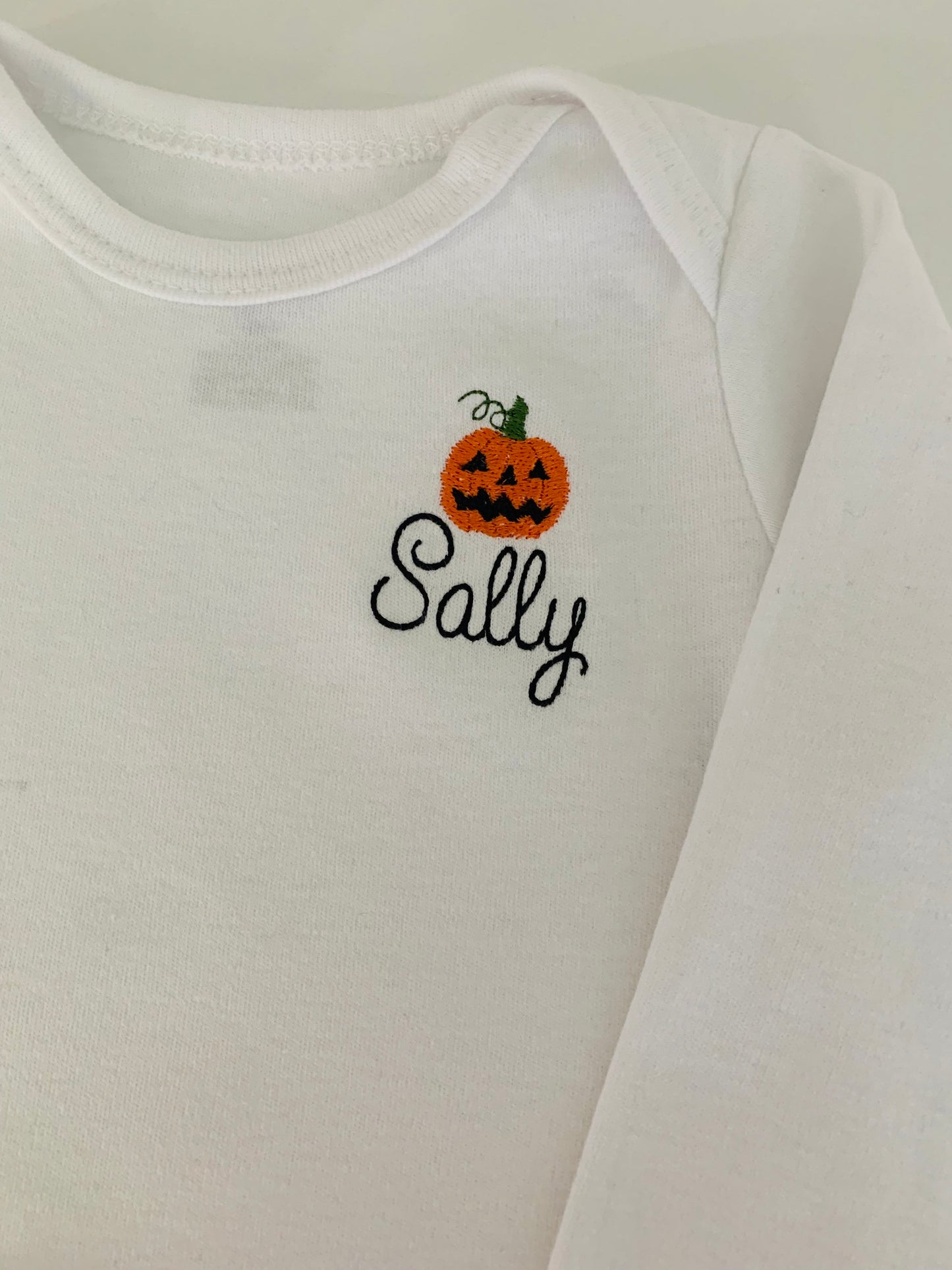 Vintage Halloween Jack o’ lantern pumpkin Long Sleeve Embroidered Personalized baby ONESIES® Brand bodysuit, Halloween baby bodysuit